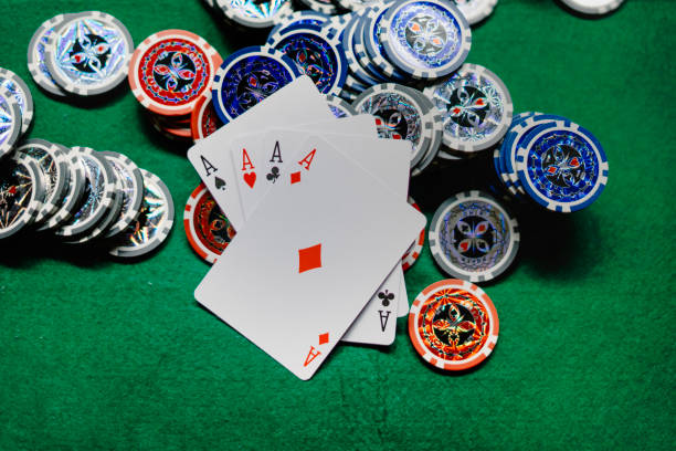 playing poker cards and chips at the poker table